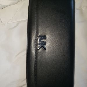 MK crossbody clutch